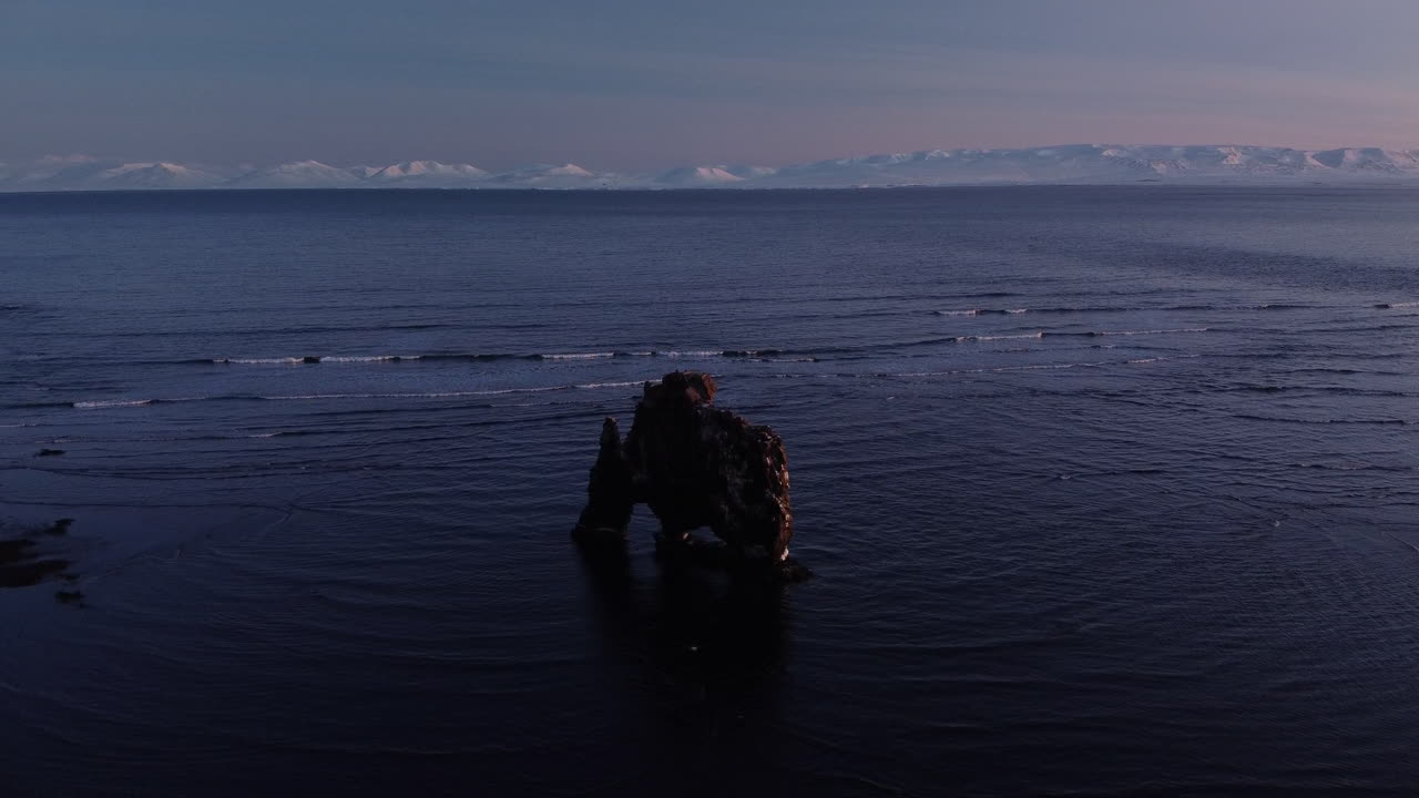 Lonely and remote cliff of Hvitserkur in the fjord of north Iceland. It's famous because it looks like a prehistoric creature turned into stone