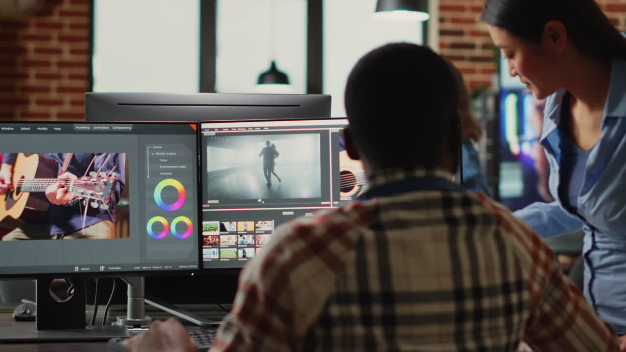 Professional video editors analyzing film montage before editing