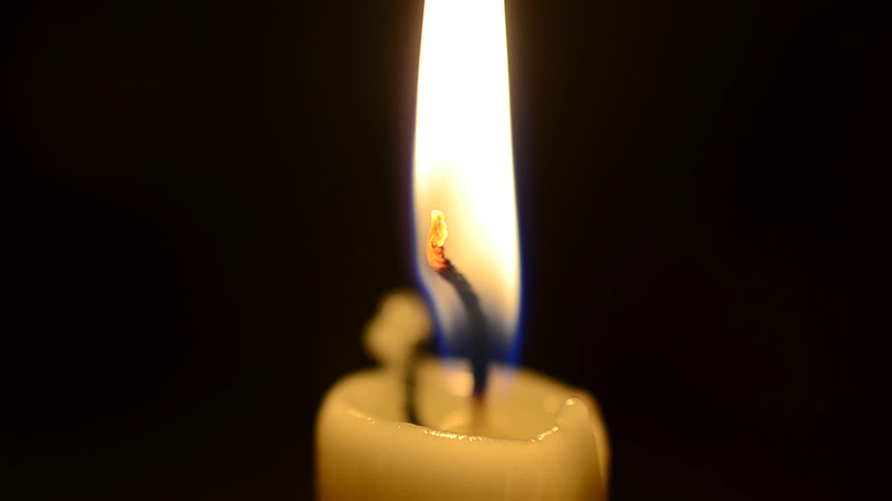 Candela accesa. Candele, macrofotografia