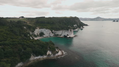Coastal Cliffs and Turquoise Bay, New Zealand