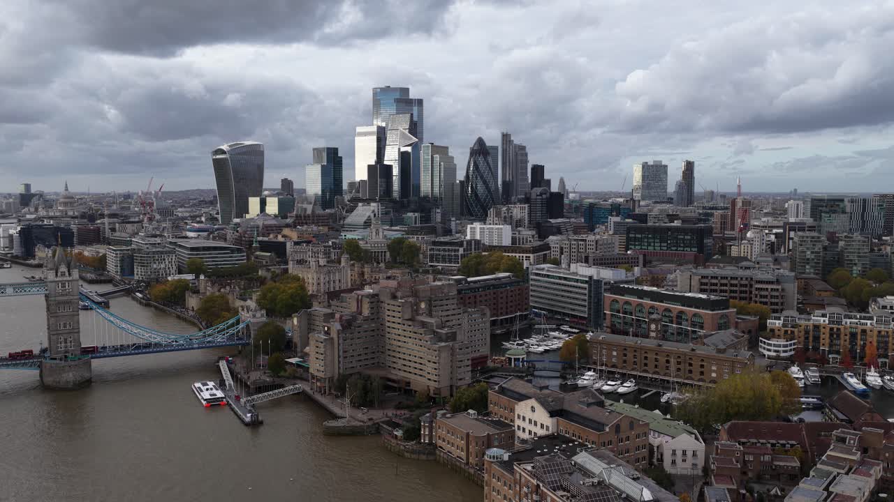 The City of London, The Square Mile, its historic and financial center, skyscrapers, and urban business district in The United Kingdom. Aerial drone video