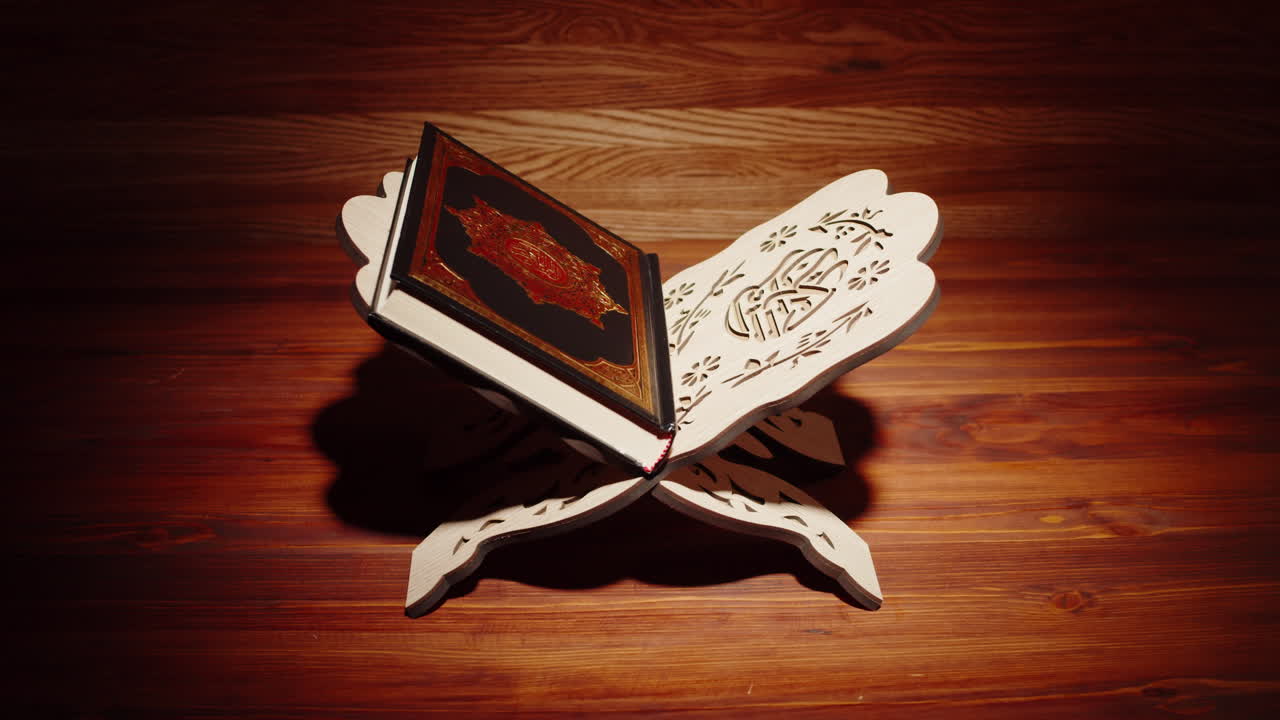 Quran book close-up, praying, islamic religion. Religious holiday Ramadan, holy month. Worship, making traditional prayer to God