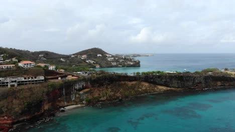 abandoned apartment building on tropical peninsula, grenada