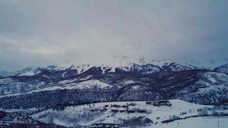 Very-dark-and-moody-drone-aerial-view-of-mountains-in-Telluride,-Colorado