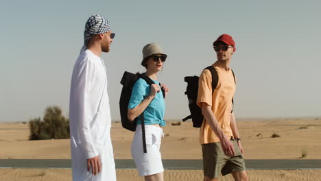 three travelers in the desert