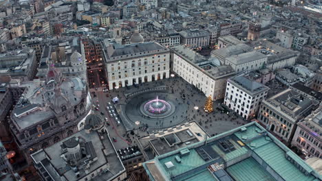 Piazza-De-Ferrari-city-square-tourist-attraction-in-Genoa-Italy,-aerial-view