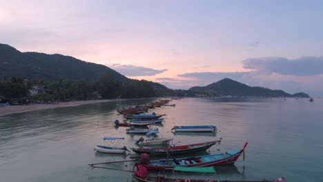 Flying-Over-Boats-at-Sunrise