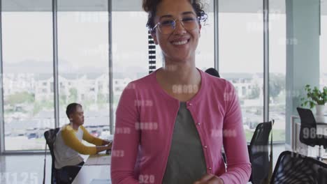 Animación-De-Números-Cambiantes-Sobre-Una-Mujer-Birracial-Usando-Una-Tableta-En-Una-Sala-De-Reuniones-En-La-Oficina