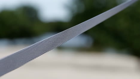 close-up of a metal file's textured surface
