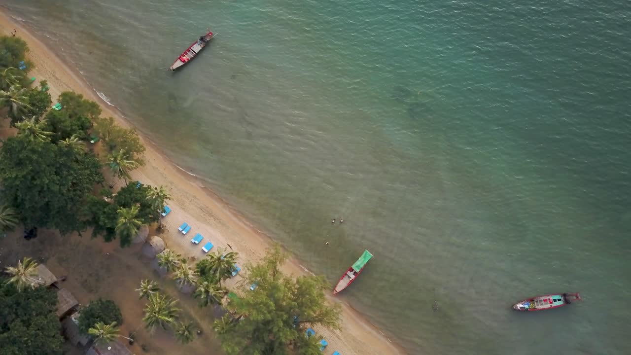Tropical Beach with Boats and Bungalows