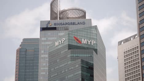 modern skyscrapers featuring singaporeland and myp logos