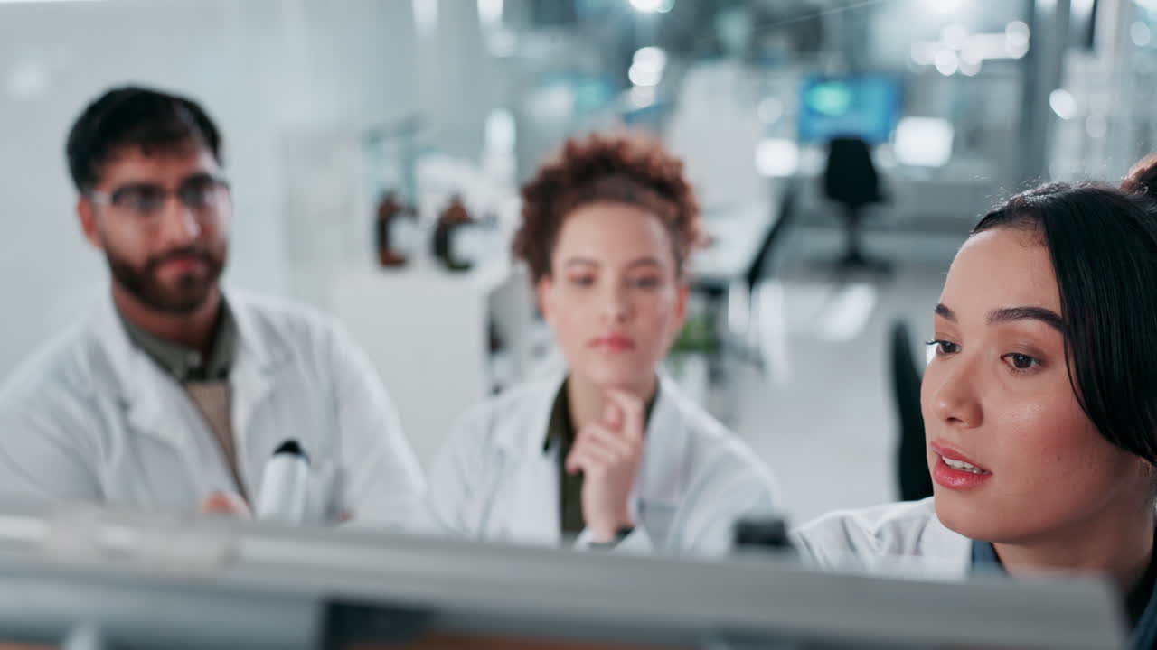 Scientists Collaborating in a Lab