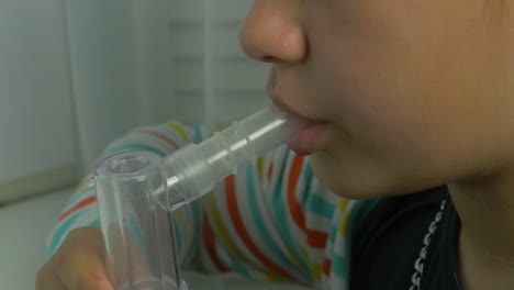 child using inhaler