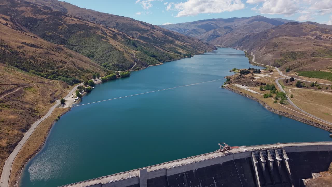 Aerial view of Clyde Dam and Lake Dunstan in New Zealand's scenic landscape