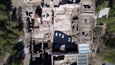 Aerial-top-down-view-of-the-ruins-of-the-Antigua-Fábrica-de-Cemento-Asland-in-Catalonia,-Spain