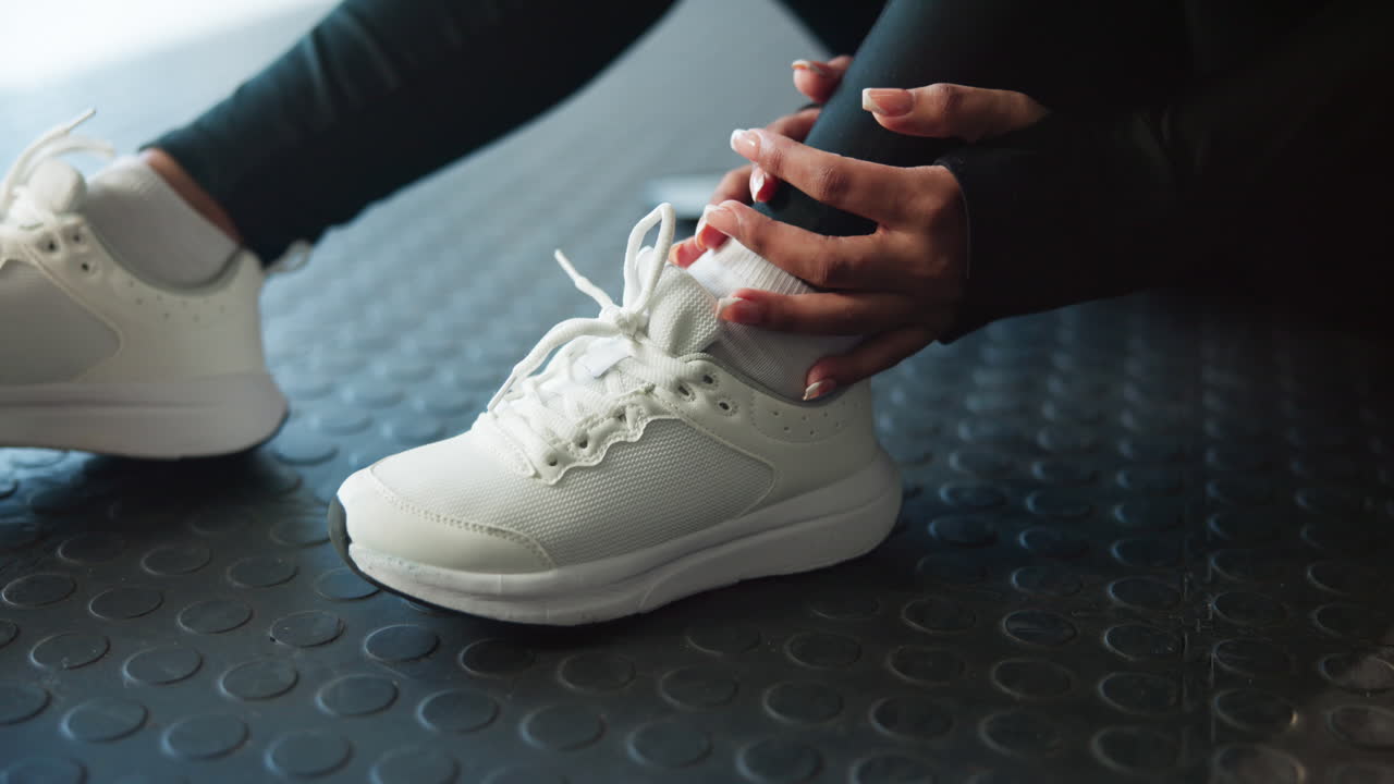 Fitness Woman Tying Shoelaces