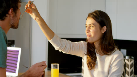 woman feeding food to her man 4k