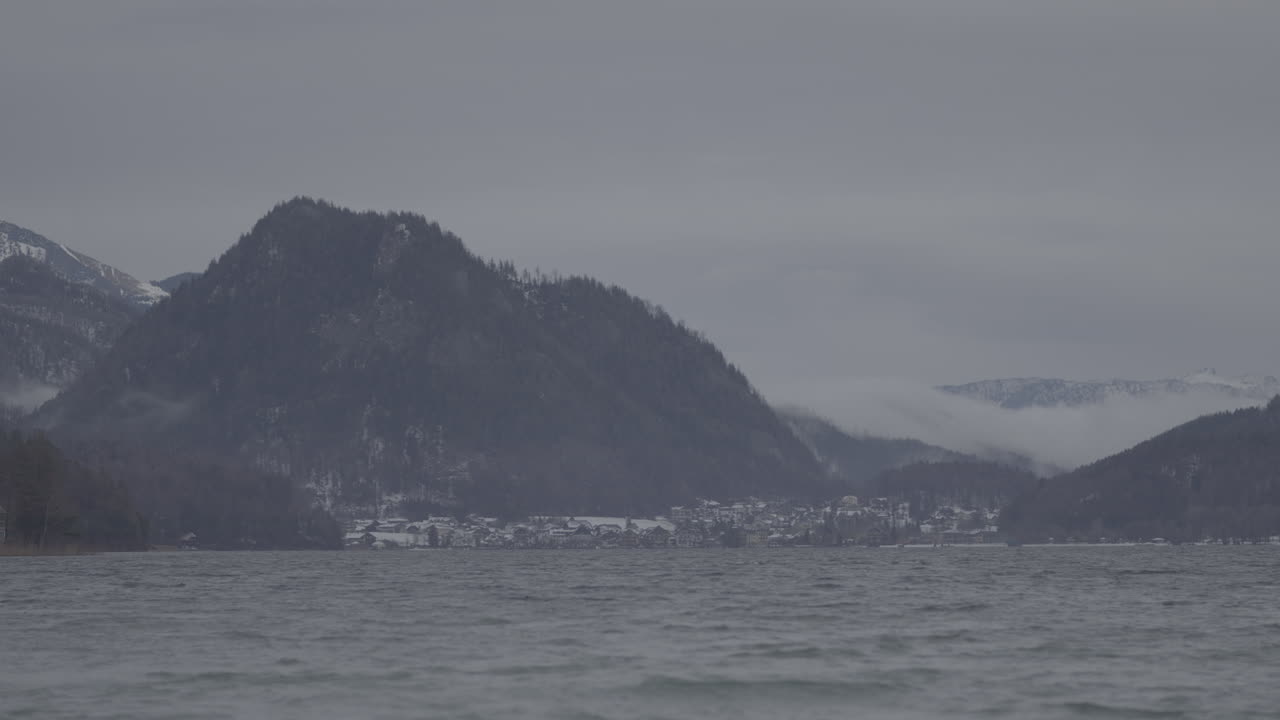 Winter Landscape with Mountain, Lake, and Village