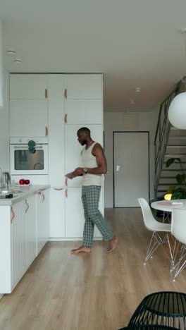 man cooking in a modern kitchen