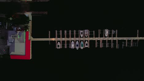 Nighttime-overhead-view-of-Sebastian's-boat-dock-in-Indian-River-County,-Florida