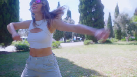 woman dancing in a park