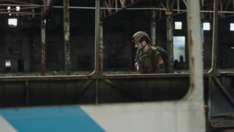 military personnel in a damaged building