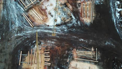 a view from above: aerial footage of a log-home construction site in the british columbia, canada