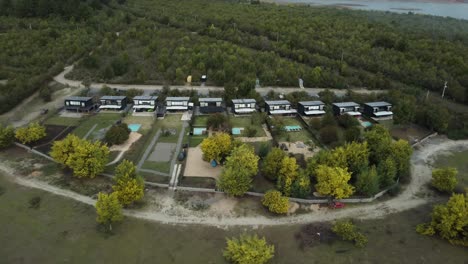 flight over a small condominium near a lake