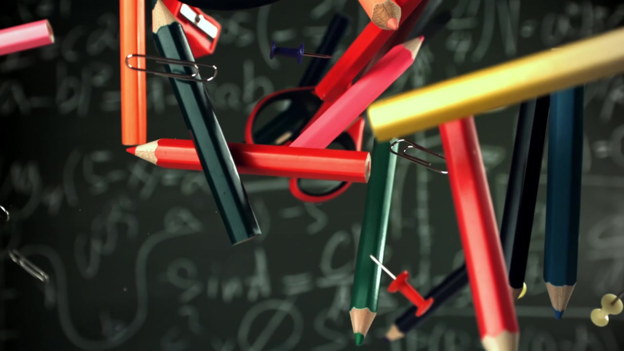 Colorful School and Office Supplies Floating Against a Chalkboard with Math Equations
