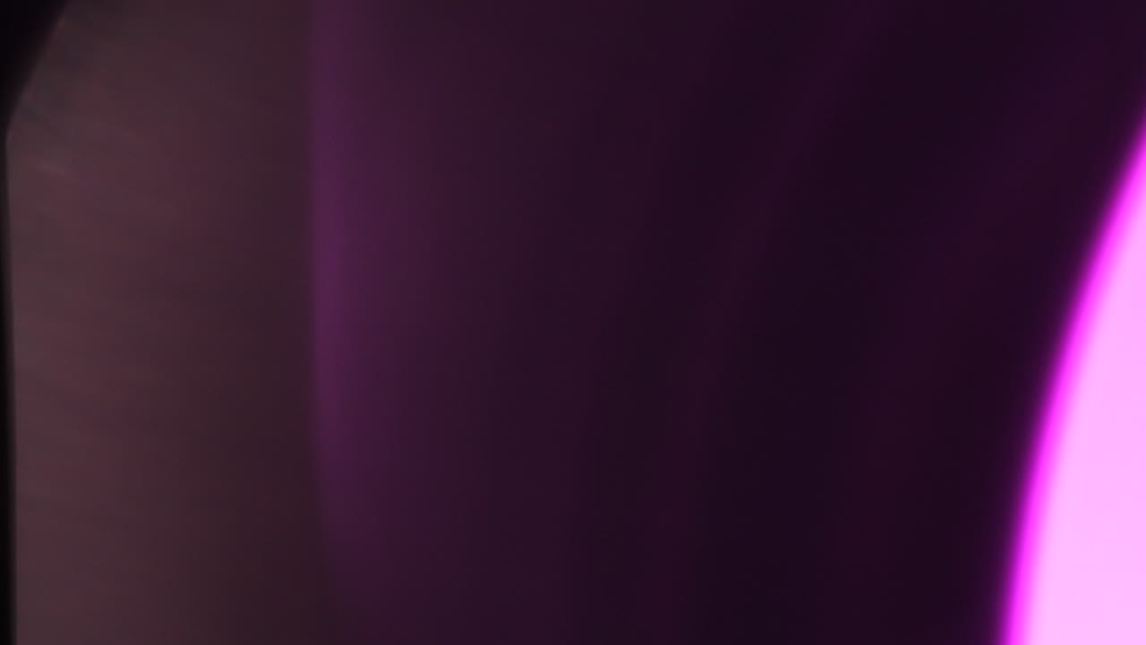 Light leaks transitions on black background