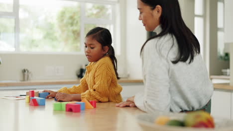 Woman,-girl-and-building-blocks