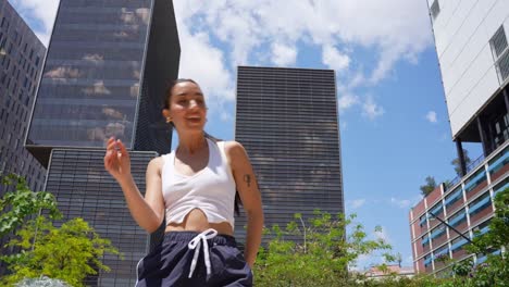 woman dancing in an urban park