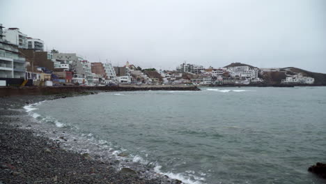 ocean waves calmly crashing along the coastal district of san bartolo, lima, peru