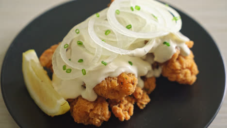 snow onion chicken or fried chicken with creamy onions sauce with lemon in korean style - korean food style