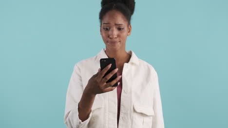 dissapointed woman watching video on phone