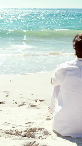 man relaxing on the beach