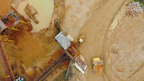 excavator loader working at sand mine. mining machinery at sand quarry