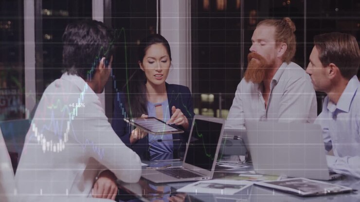 Business people are discussing over a digital tablet in office