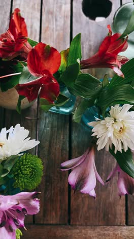 colorful flower arrangement on wooden table