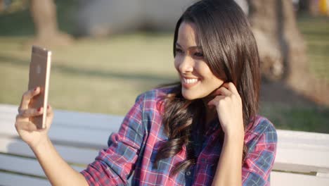 Girl-Making-Selfie-Outdoor