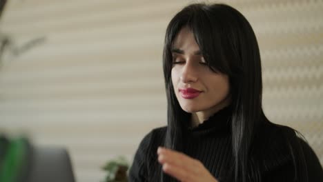 professional woman in a modern office environment, focused on work, dressed elegantly in business attire, surrounded by office equipment and a sleek interior
