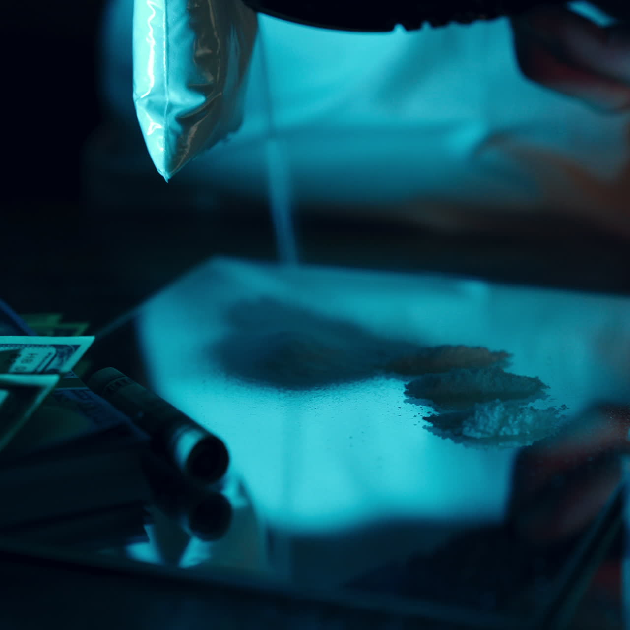 Drug dealer takes a package with a drug and cuts it with a knife to sample it. Abuse of drugs. Criminal Business Square video