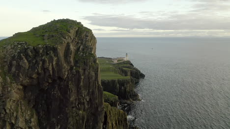 an aerial, evening view of neist point lighthouse on the isle of skye