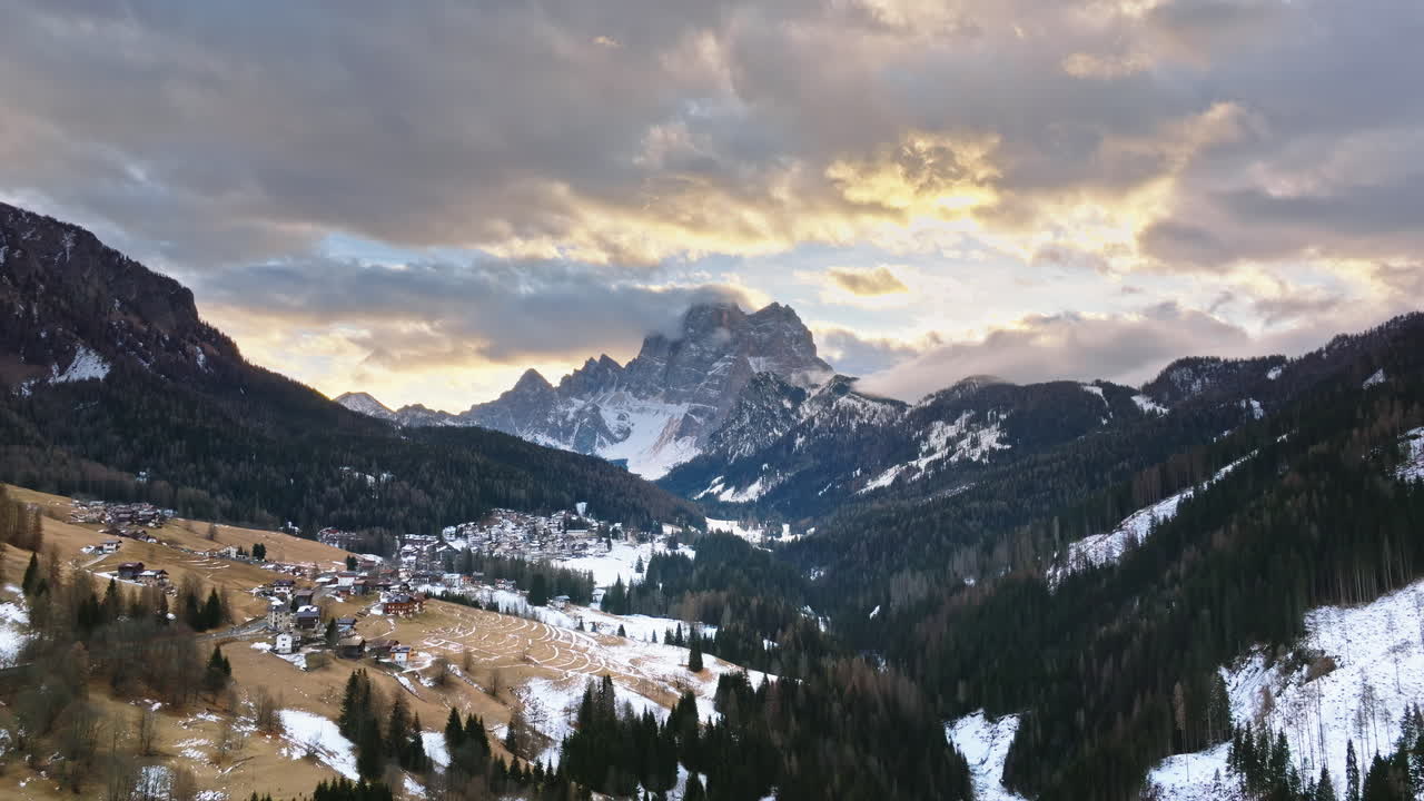 Aerial drone view of snow on the mountains in the Dolomites, Italy