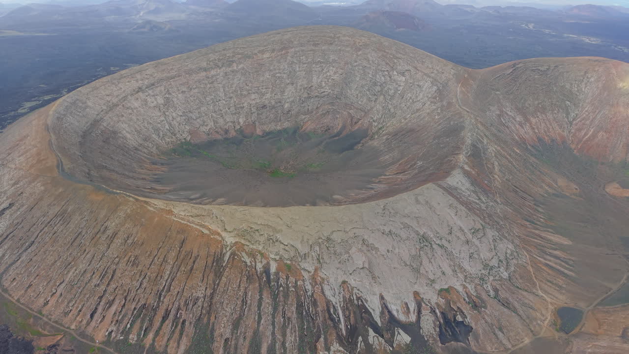 Incredible aerial perspective of the impressive Caldera Blanca volcano crater in Lanzarote