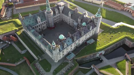 aerial drone view of kronborg castle which is located in denmark near copenhagen, it is in front of sweden across the north sea