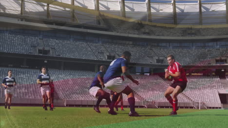 rugby players performing on field with empty stadium seats in background