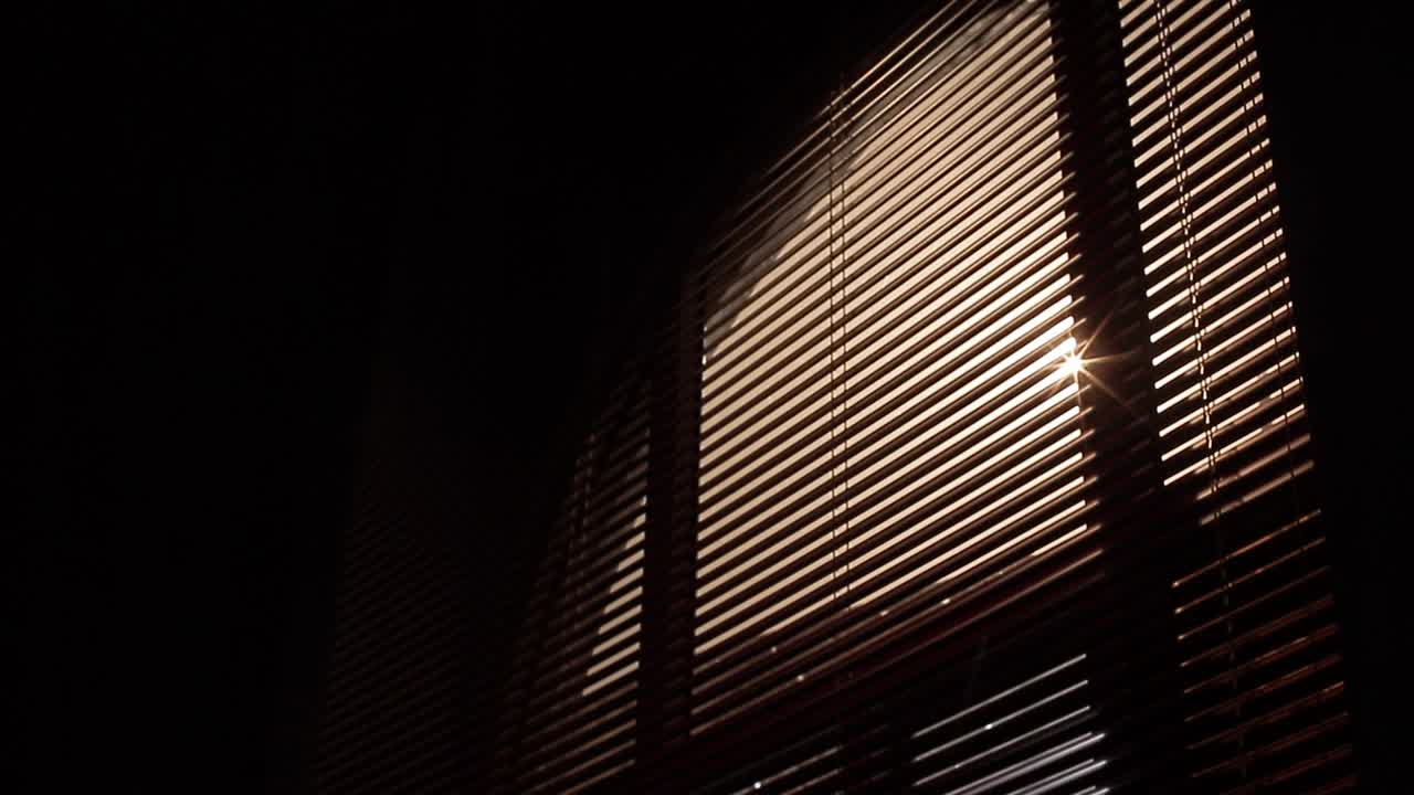 Interior of window blinds obscuring the sun building and architecture office house