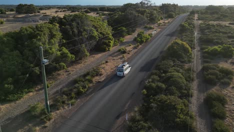 Vehicle-driving-along-rural-road-in-Margaret-River-area,-Western-Australia