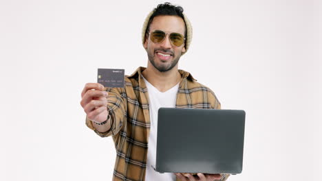 Man,-credit-card-and-laptop-in-studio